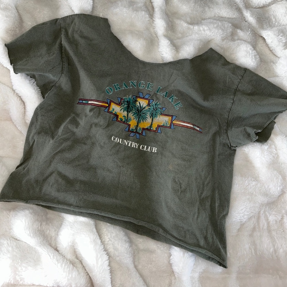 green graphic tee